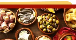 Comer en España